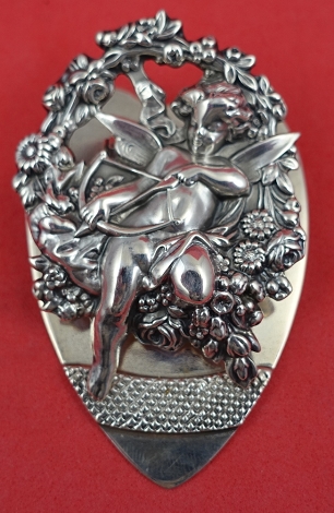 Paper Clip / Desk Paper Holder #4633 w/ figural cupid, bow & arrow, flowers, and heart wt. 1.6ozt 2